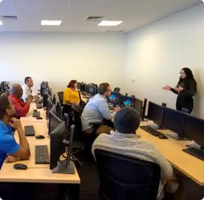 woman teacher instructing technology class