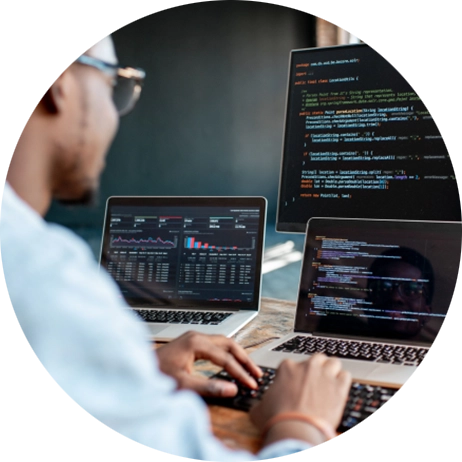 Man coding on a laptop