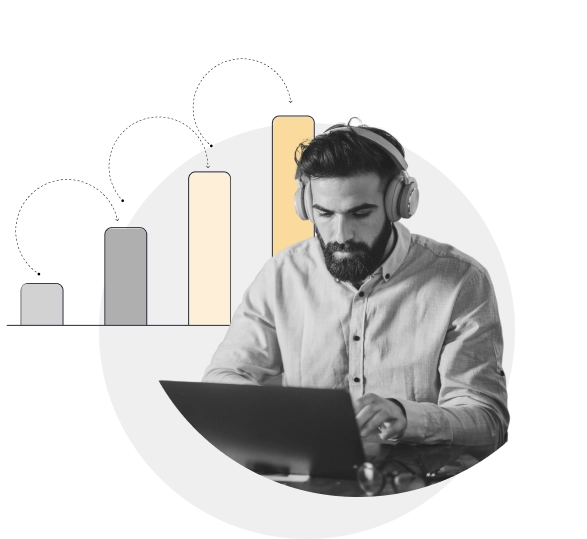 Man with headphones using laptop with chart superimposed