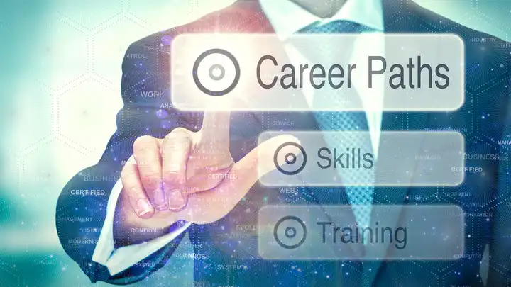 man in suit with finger hovering over floating career path icon