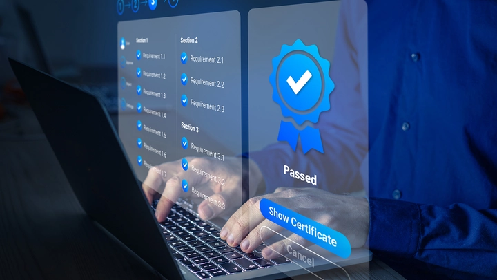 person on laptop with badges floating over